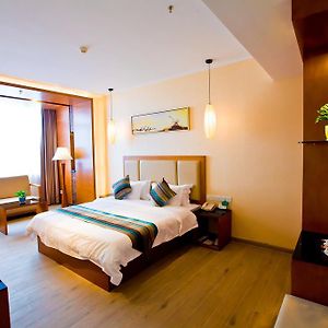 Kamer met een Queen Size Bed